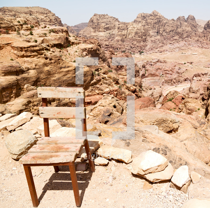 old chair in a desert 