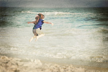 Child playing on the seashore.