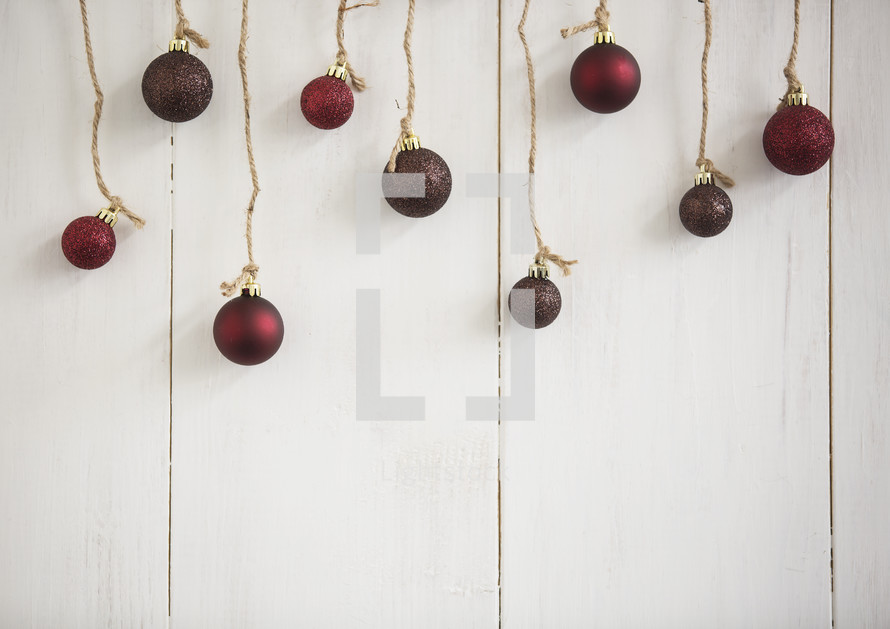 Christmas ornaments hanging on twine 