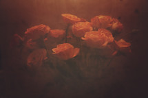 a bouquet of roses taken from behind a smudgy glass window