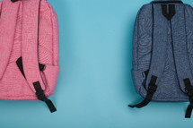 pink and blue student book bags 