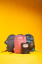 composition notebook and book bags 