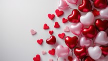 Valentine's day background with red and white heart-shaped balloons