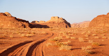 tire tracks in desert sands 