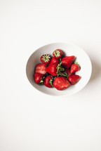 red strawberries in a bowl 