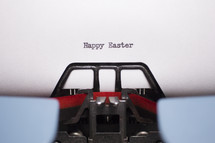 words Happy Easter typed on a typewriter 