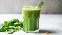Healthy green smoothie with spinach in a glass