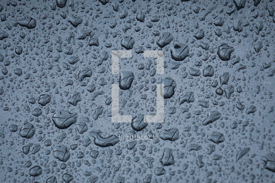 raindrops on the metallic surface in rainy days