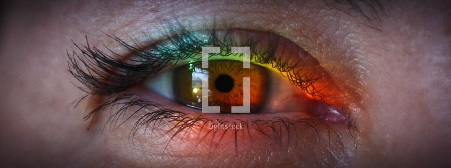 rainbow of colors in a woman's eye