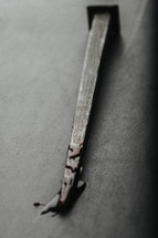 A blood covered nail from the crucifixion of Christ.