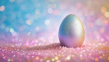 Easter egg on glitter background with bokeh lights and copy space