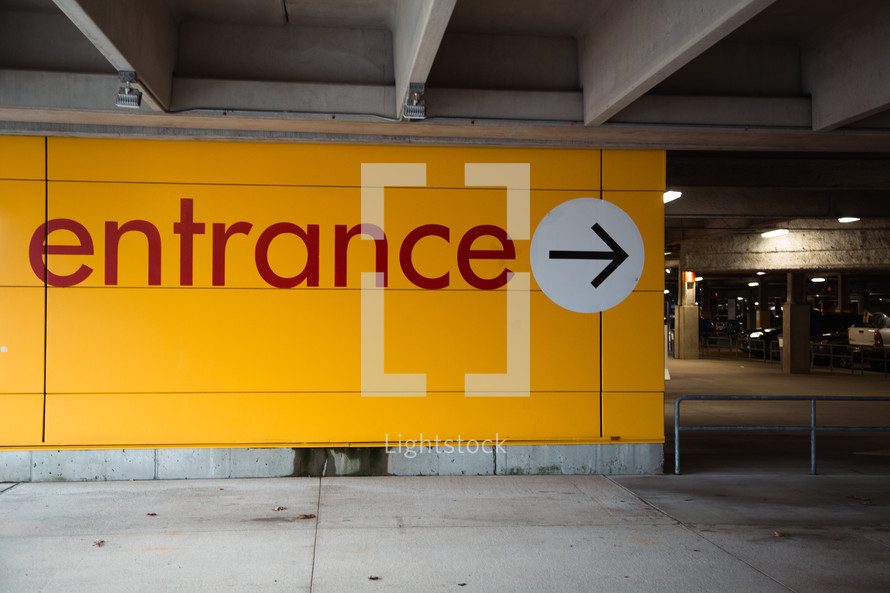 entrance sign in a parking deck 