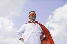 A Dad in a superhero cape 