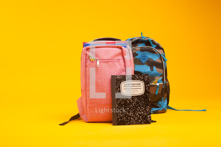 composition notebook and student book bags 