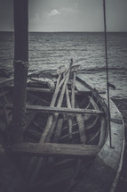 sticks in a wooden boat