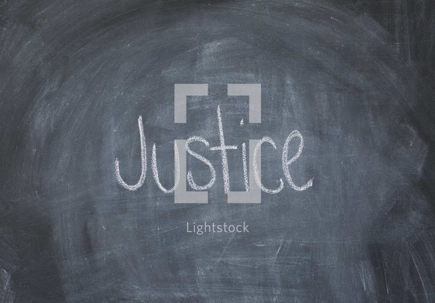 word Justice on a chalkboard 