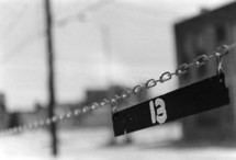 # 13 sign hanging on a chain 