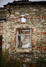 windows in a stone building ruins 