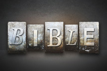 Stone tiles spelling the word BIBLE.