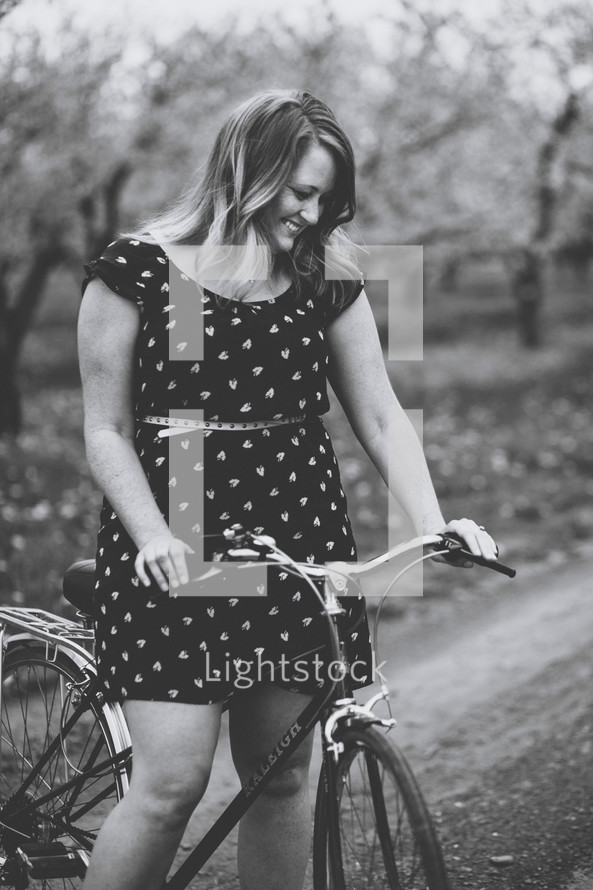 a woman on a bicycle 
