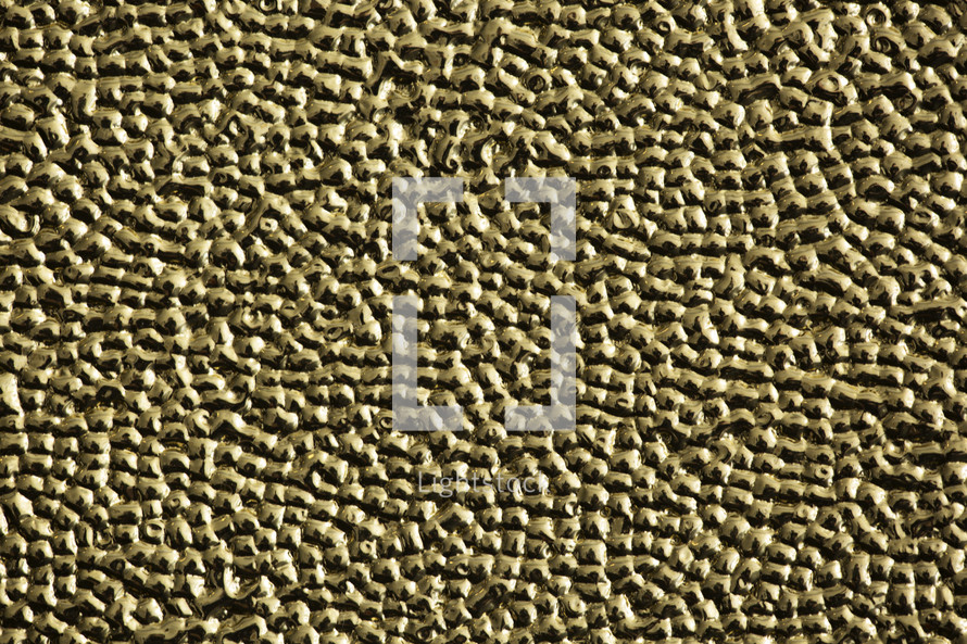 gold metallic textured background.