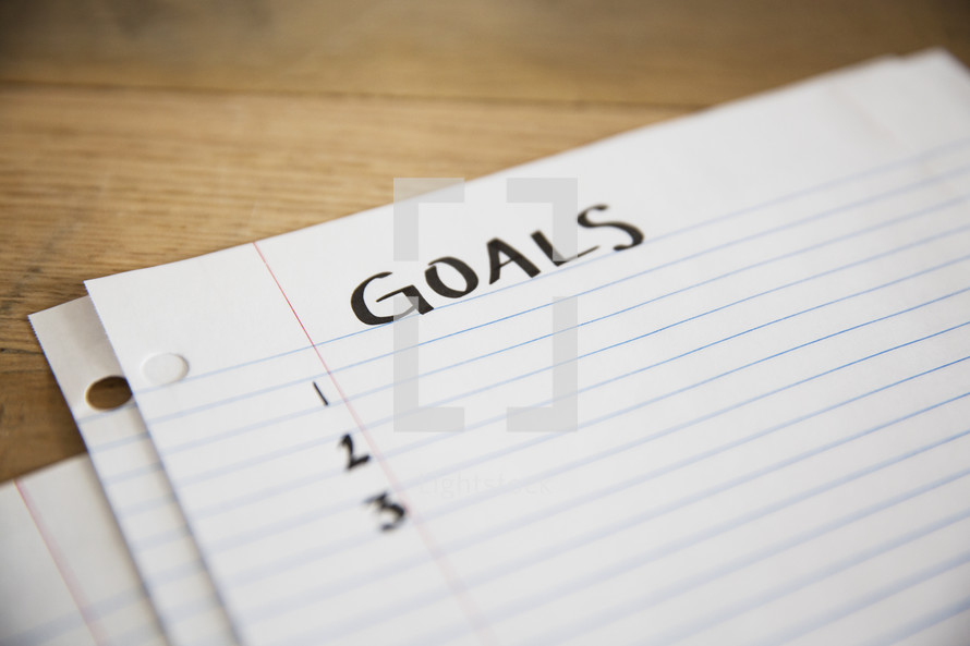 list of Goals written on paper. 