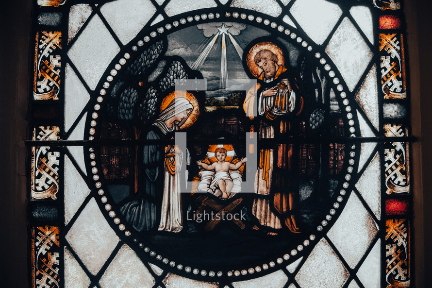 manger Jesus stained glass window 