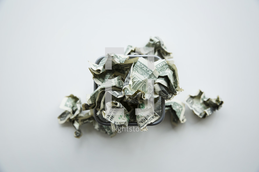 crumpled dollar bills 