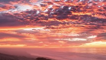 Beautiful sky at sunrise over ocean coast in New Zealand beach nature Time Lapse

