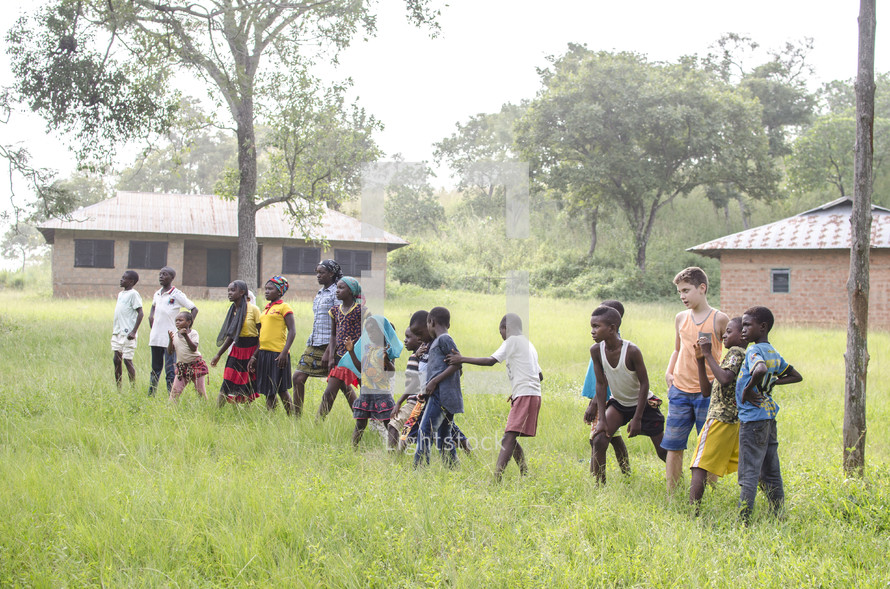 village children playing outdoors 