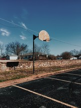 basketball goal in a parking lot