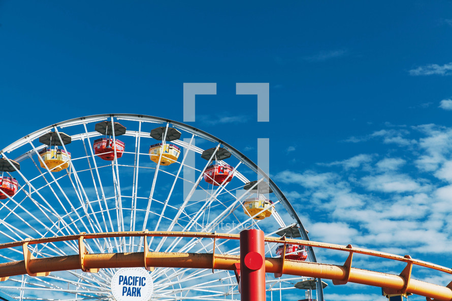 ferris wheel against a blue sky 