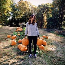 woman in a pumpkin patch 