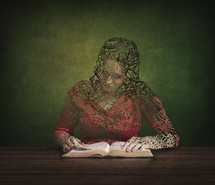 artistic woman reading a Bible 