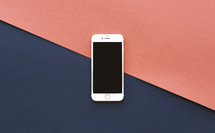 iPhone on a red and navy background 