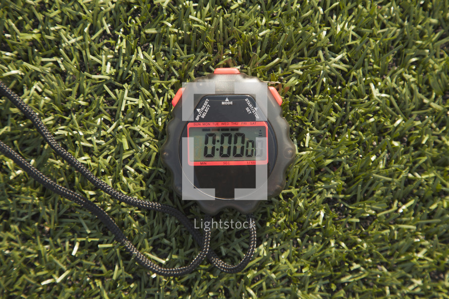 stopwatch in grass 