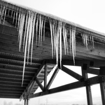 icicles hanging from a gutter 