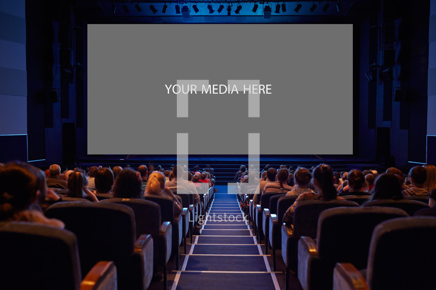 Empty cinema screen with audience
