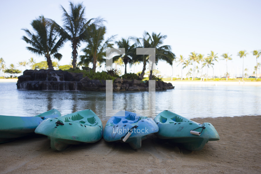 canoes on the shore in Honolulu 