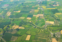 Aerial view of green pattern fields above germany