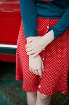 young woman in red skirt 