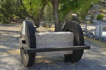 This wheeled cart was the kind of tool used to move large quarried stones into position for building in ancient times