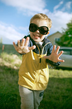 Happy boy in big sunglasses outdoor