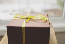 a simple gift box with bright ribbon