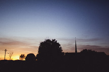 a church steeple at dusk