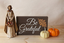 Be Grateful sign with pilgrim 