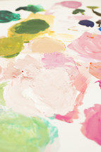 Paint colors on a white canvas.