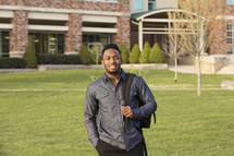 a young man on a college campus 