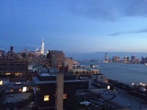 NYC skyline under evening light
