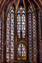 medieval stained glass windows in a cathedral 